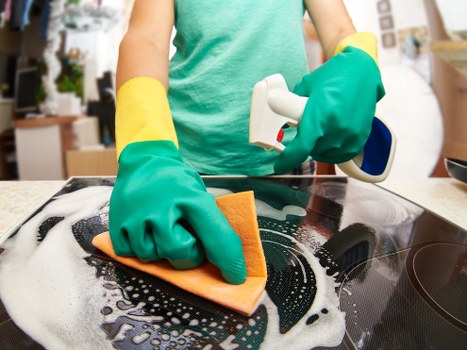 Carpet care specialist treating stains in Morden Park property