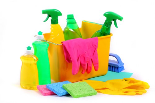 Staff member using protective equipment during carpet cleaning